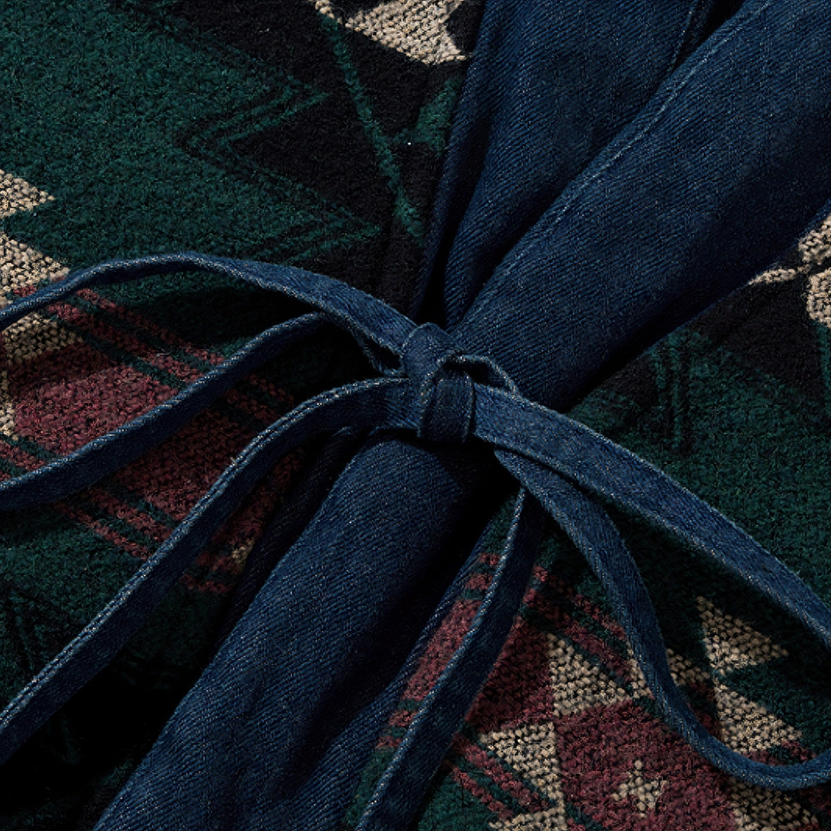  Side tie drawstring detail of OROMEN KIMONO018 Reversible Kimono Coat, adjustable hem cord, navy cotton, wabi-sabi design accent