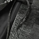 Side tie drawstring detail of OROMEN KIMONO021 Patchwork Kimono Jacket, grey cotton cord against houndstooth body panel