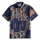 Silk Road Patchwork Hawaiian shirt front flat lay showing full patchwork block layout with indigo ikat stripes, dark brown florals and ethnic geometric panels