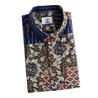 Silk Road Patchwork shirt folded display showing button-down collar, OROMEN label, coconut buttons and dark brown floral with ethnic geometric patchwork panels