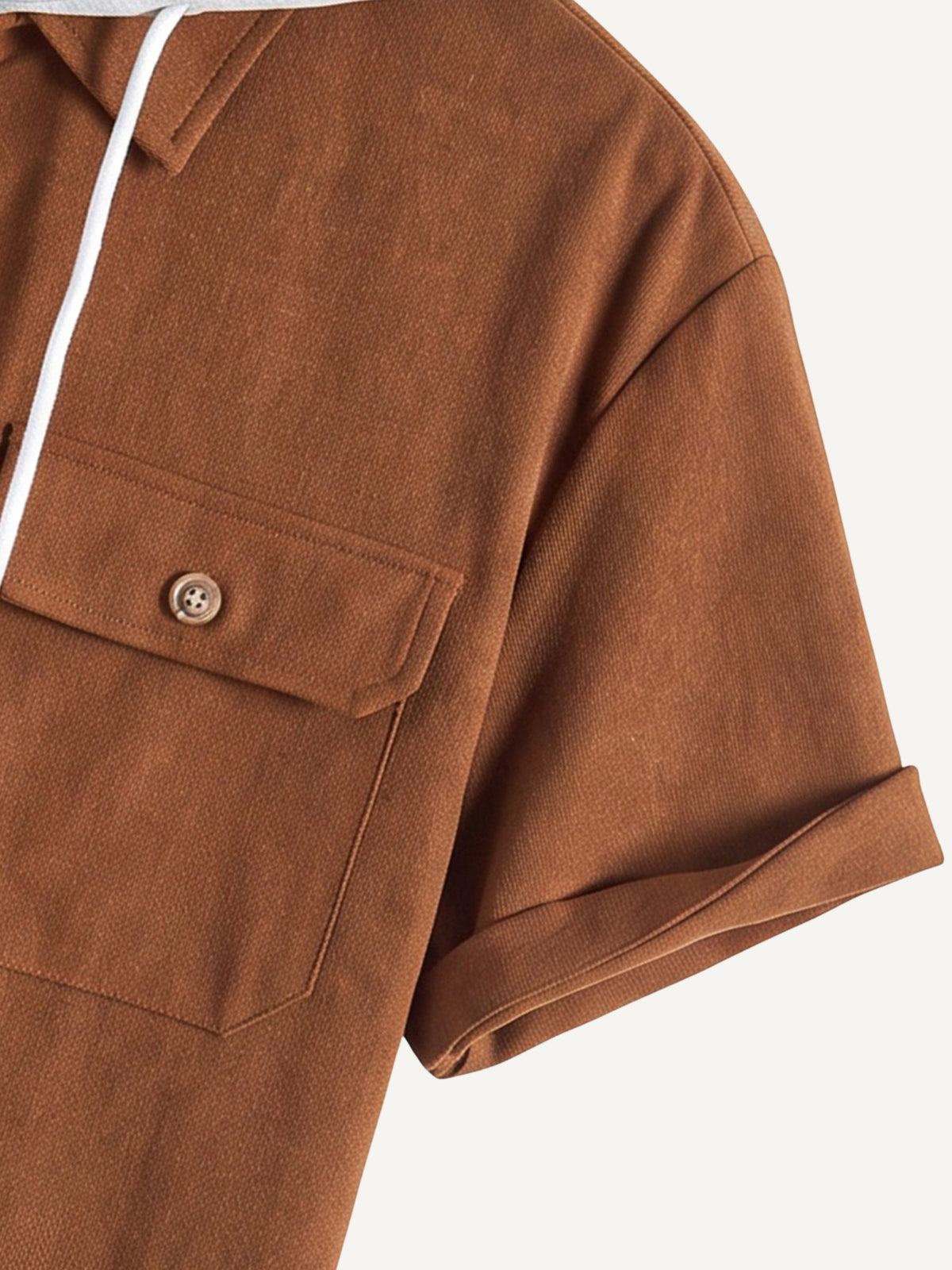 Sleeve cuff with roll tab detail on OROMEN Rust Hooded Utility Shirt