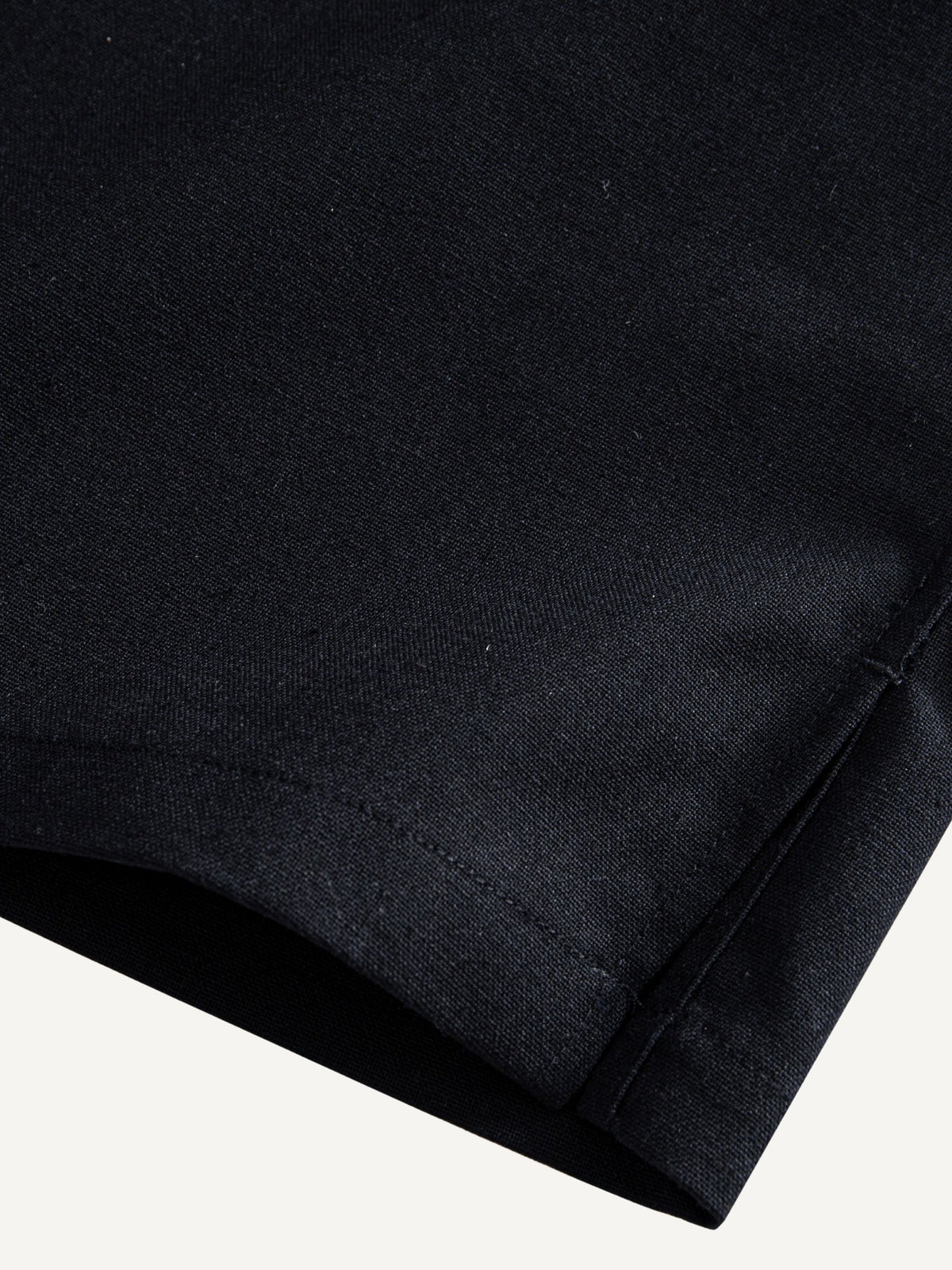 Straight hem and side vent detail on OROMEN Ink Wash Cotton-Linen Shirt