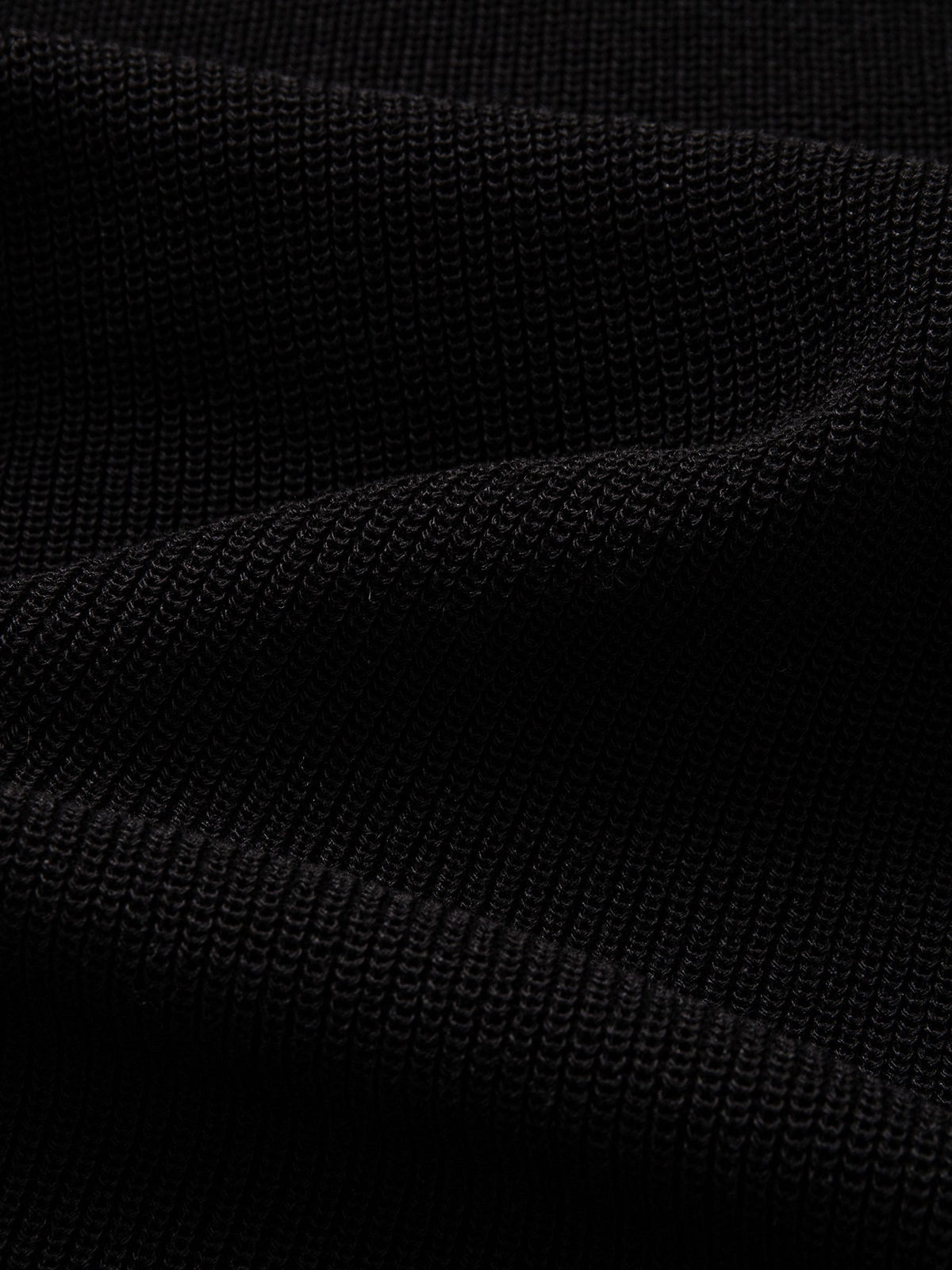 Texture detail of breathable lyocell and linen blend knit fabric with fine vertical ribbing
