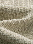 Textured waffle rib knit fabric detail of breathable linen-lyocell blend cardigan