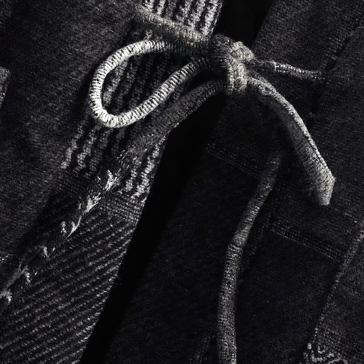 Tied drawstring knot detail on OROMEN KIMONO021 Patchwork Houndstooth Kimono Jacket, styled hem tie, grey cotton cord