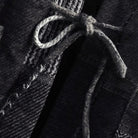 Tied drawstring knot detail on OROMEN KIMONO021 Patchwork Houndstooth Kimono Jacket, styled hem tie, grey cotton cord