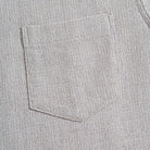 Two-tone woven shirt chest pocket detail - beige white casual design