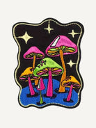 Vibrant psychedelic mushroom embroidery artwork on OROMEN T-shirt