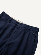 Waistband and double pleats detail of OROMEN Pleated Linen Trousers in Navy