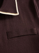 Welt chest pocket detail on OROMEN Casa Mocha Knit Polo