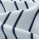 White Button Placket Close-up – Vertical Stripe Knit Shirt